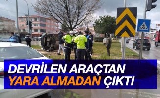 Devrilen araçtan yara almadan çıktı